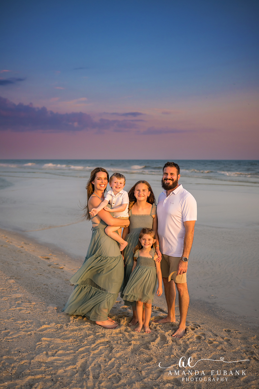 Carillon Beach Photographer – Family Walking the Beach Together Family of five walking together along the beach in Carillon Beach, Florida