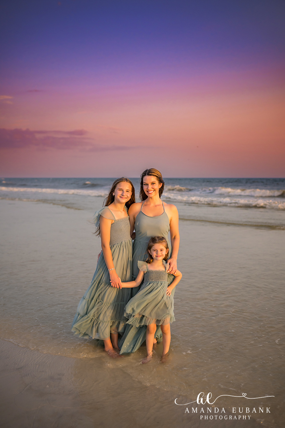 Carillon Beach Photographer – Mom and Son on the Shoreline Mother holding her toddler son while walking along the shoreline in Carillon Beach, Florida