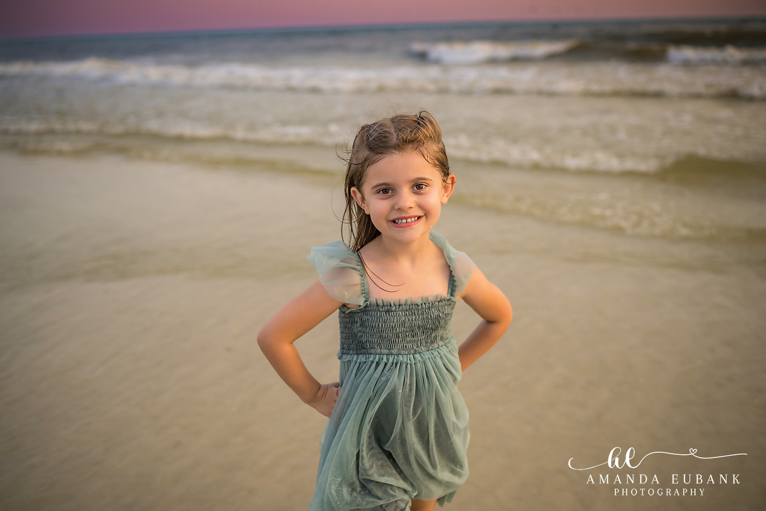 Carillon Beach Photographer – Little Girl in Sage Green Little girl in a sage green dress standing on the beach in Carillon Beach, Florida
