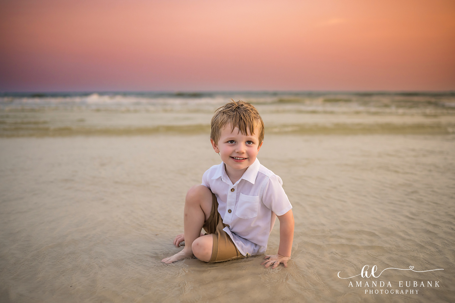 Carillon Beach Photographer – Little Boy on the Sand Toddler boy sitting on the beach in Carillon Beach, Florida