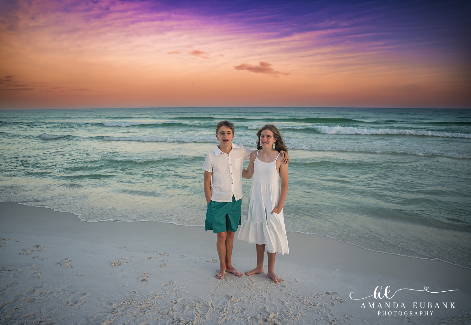 Destin Family Photographer – Mother and Son by the Shore Mother and son standing together by the shoreline in Destin, Florida