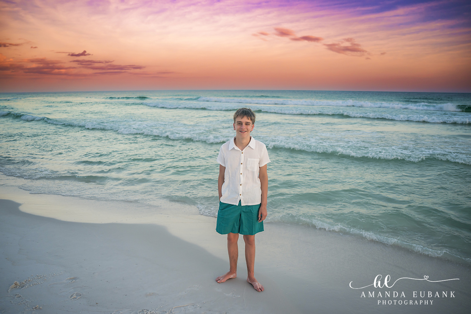 Destin Family Photographer – Candid Beach Portrait of a Son Young boy smiling on the beach in Destin, Florida during golden hour