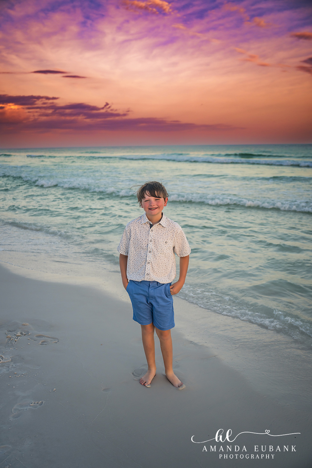 Destin Family Photographer – Young Son’s Solo Portrait Young boy standing alone on the beach in Destin, Florida