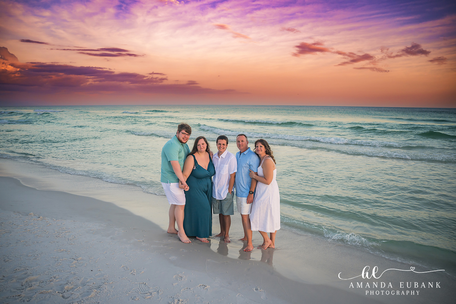 Destin Family Photographer – Family Group Portrait Family group posing together on the beach in Destin, Florida
