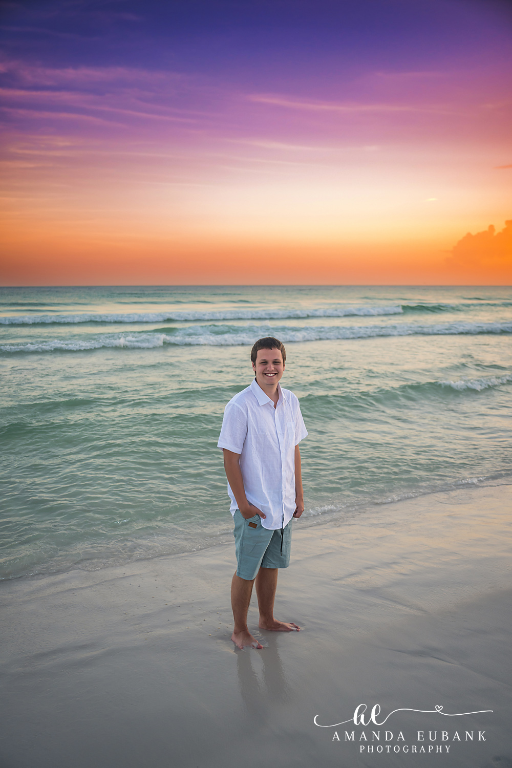 Destin Family Photographer – Solo Portrait at Sunset Man standing alone on the beach at sunset in Destin, Florida