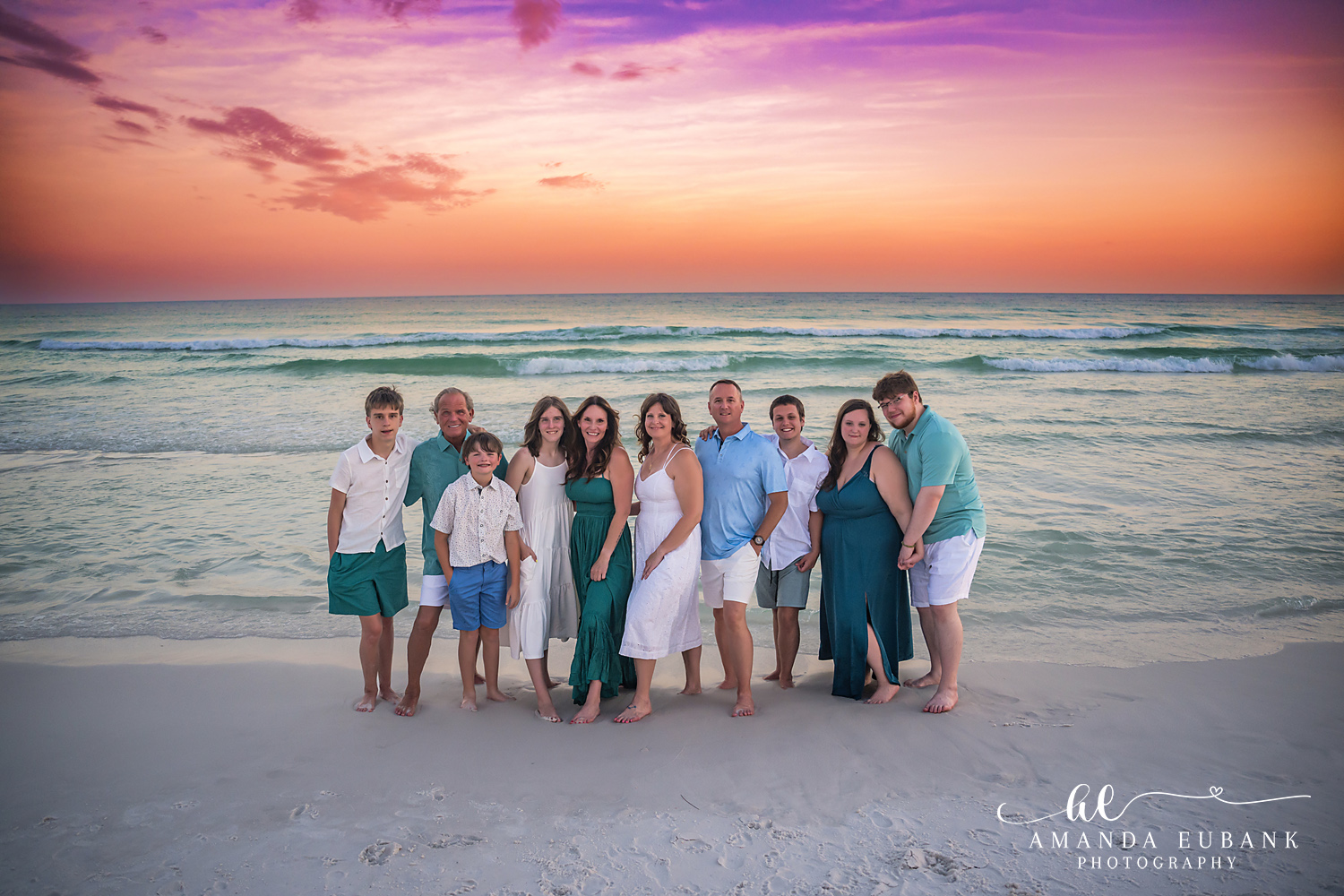 Destin Family Photographer – Big Family Beach Portrait Large extended family group standing together on the beach in Destin, Florida