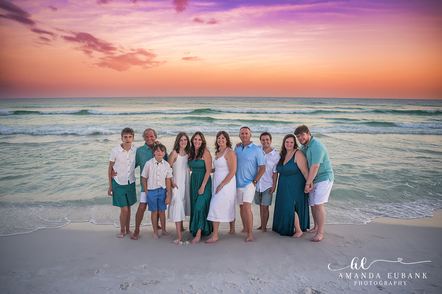 Destin Family Photographer – Extended Family Group at Sunset Large extended family group posing together on the beach at sunset in Destin, Florida