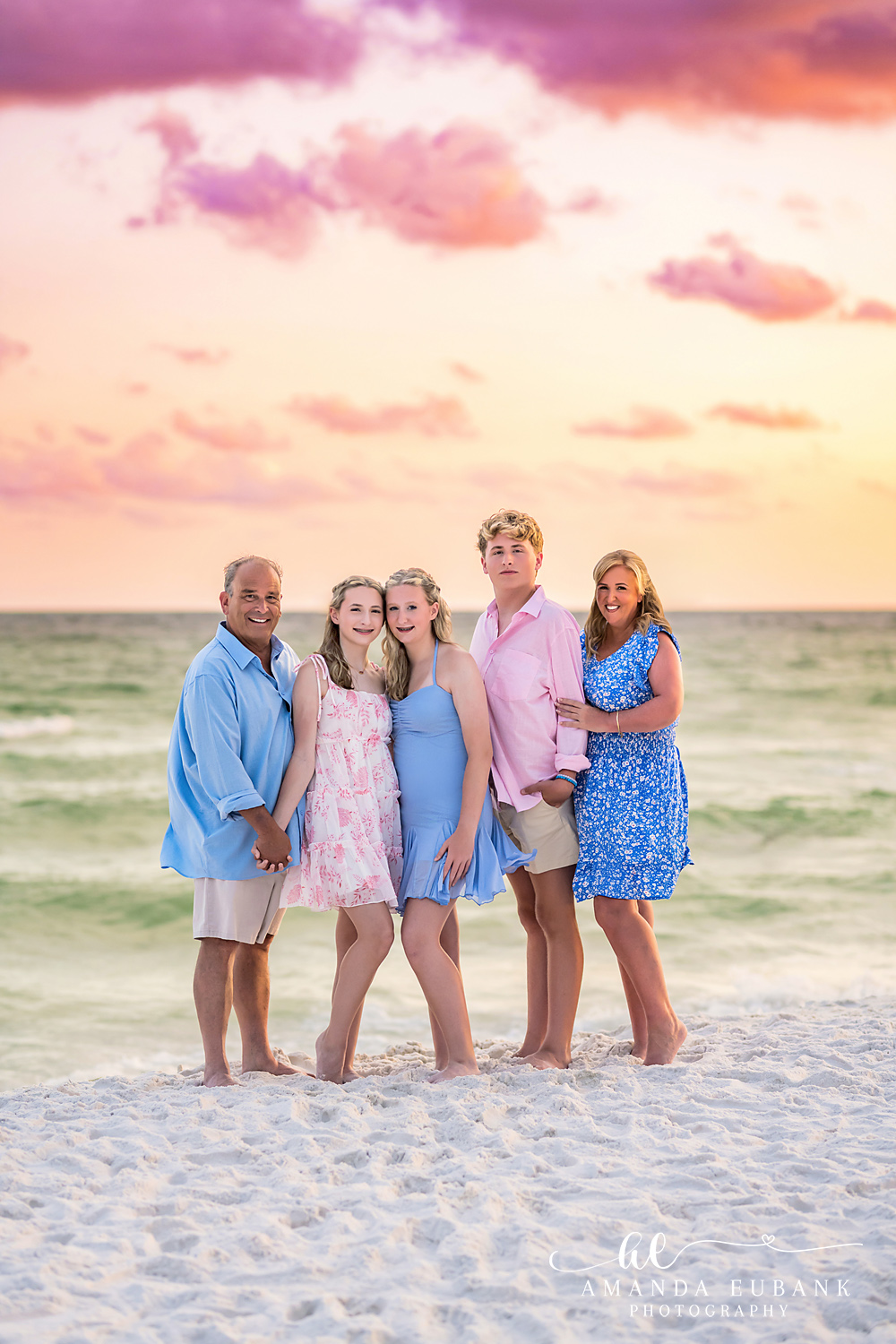 Destin Florida Extended Family Beach Portrait at Sunset Family of five in coordinated pinks and blues on the beach at sunset in Destin, Florida