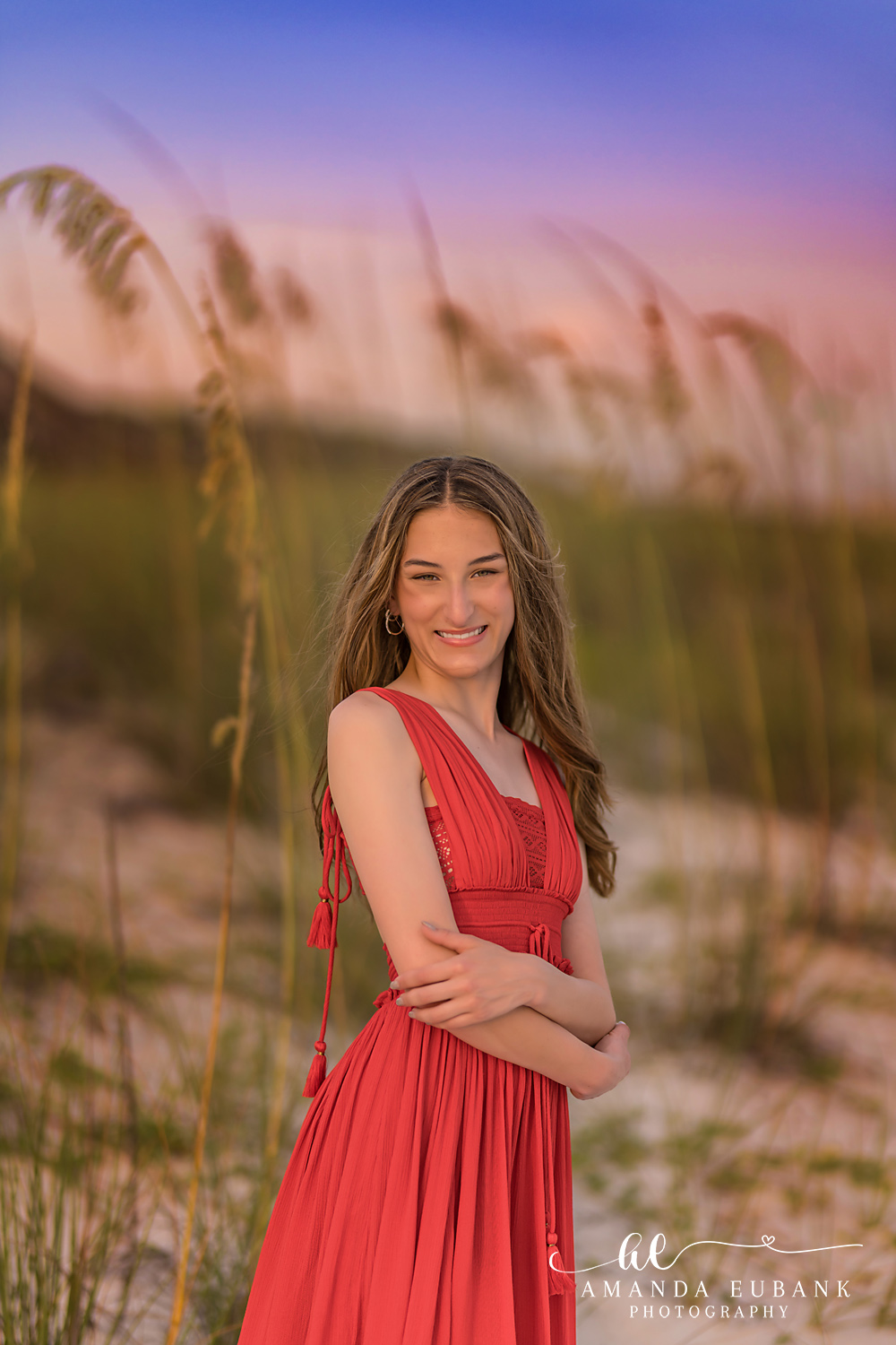 Rosemary Beach Senior Photographer – Close-Up Portrait in Red Close-up portrait of a senior in a red dress smiling in Rosemary Beach, Florida