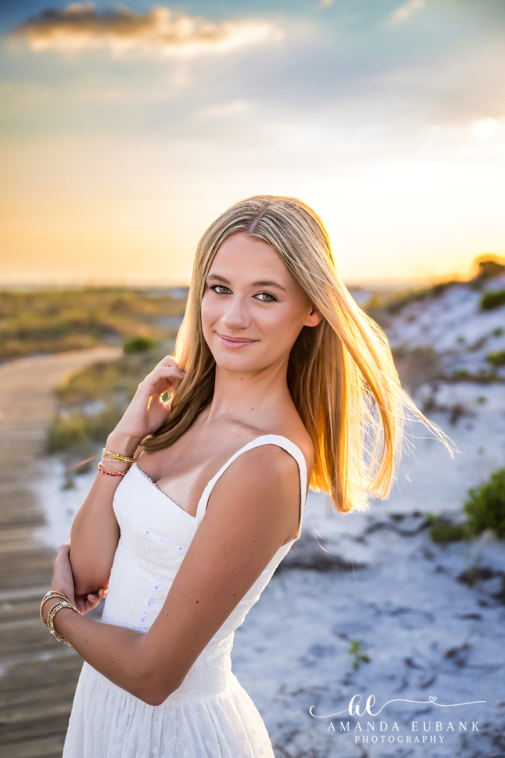 WaterSound Beach Golden Hour Close-Up Portrait Close-up portrait of a young woman with sun flare on the boardwalk at WaterSound Beach
