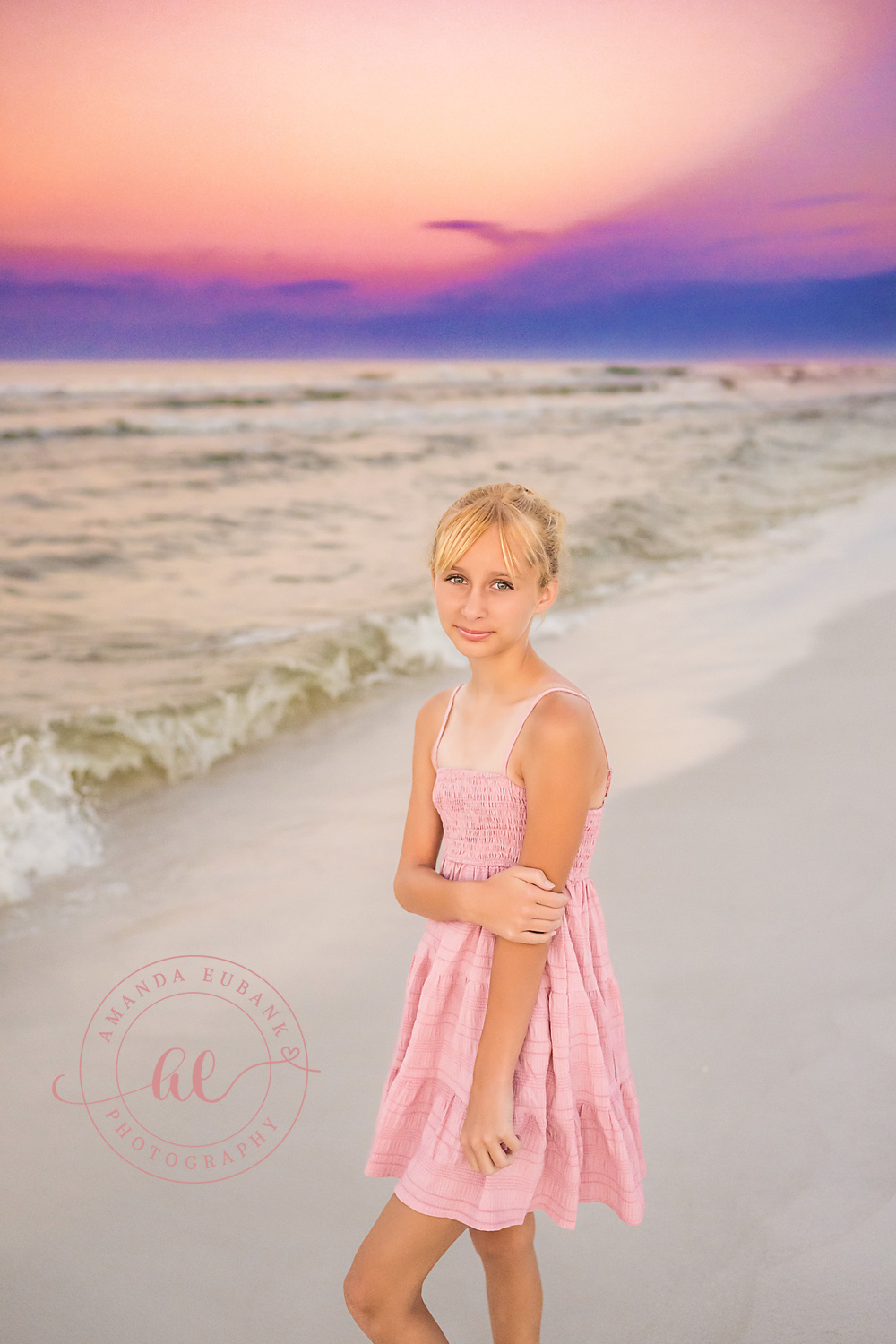 Miramar Beach Sunrise Family Photos | Young girl in a pink dress A young girl in a pink dress on the beach in Miramar Beach, Florida at sunrise, photographed by Miramar Beach family photographer Amanda Eubank