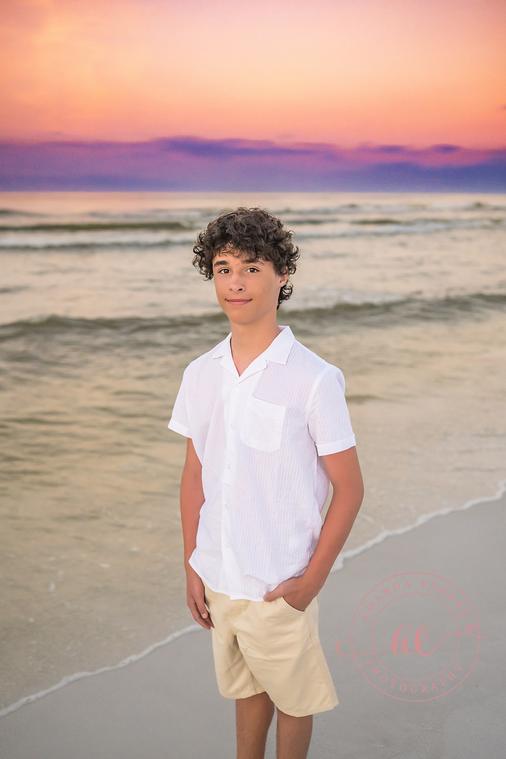 Miramar Beach Sunrise Family Photos | Boy in a white shirt A boy in a white shirt on the beach in Miramar Beach, Florida at sunrise, photographed by Miramar Beach family photographer Amanda Eubank