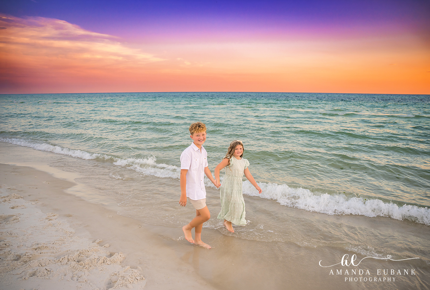 Rosemary Beach Family Photos | Kids walking along the shoreline Kids walking along the shoreline on the beach in Rosemary Beach, Florida at sunset, photographed by Rosemary Beach family photographer Amanda Eubank