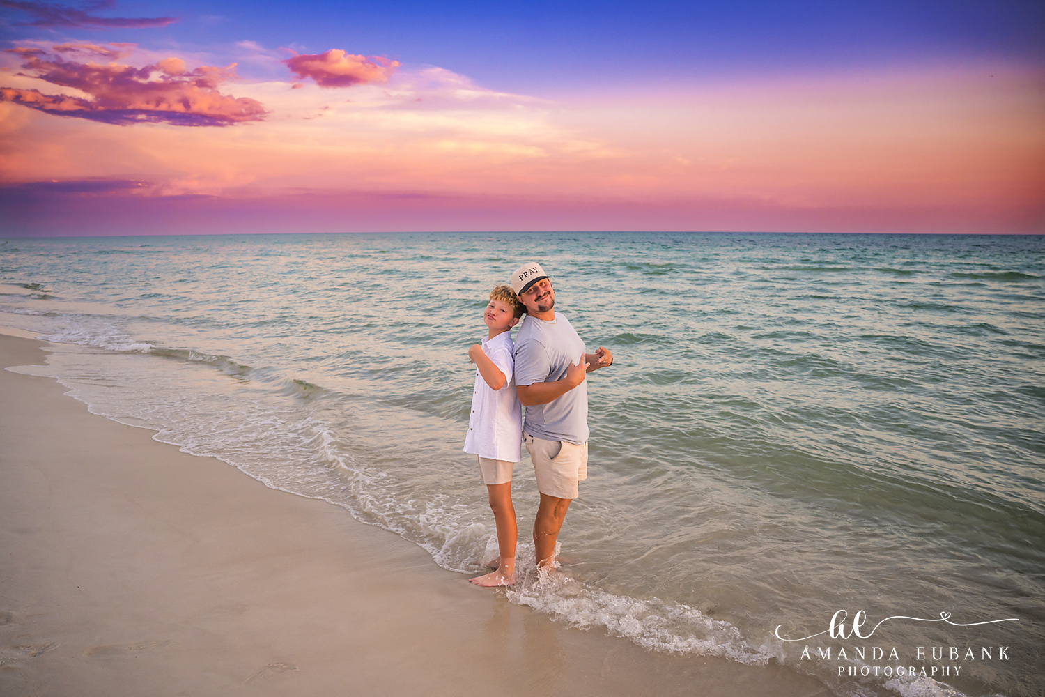 Rosemary Beach Family Photos | Sweet hug in the surf A sweet hug in the surf on the beach in Rosemary Beach, Florida at sunset, photographed by Rosemary Beach family photographer Amanda Eubank