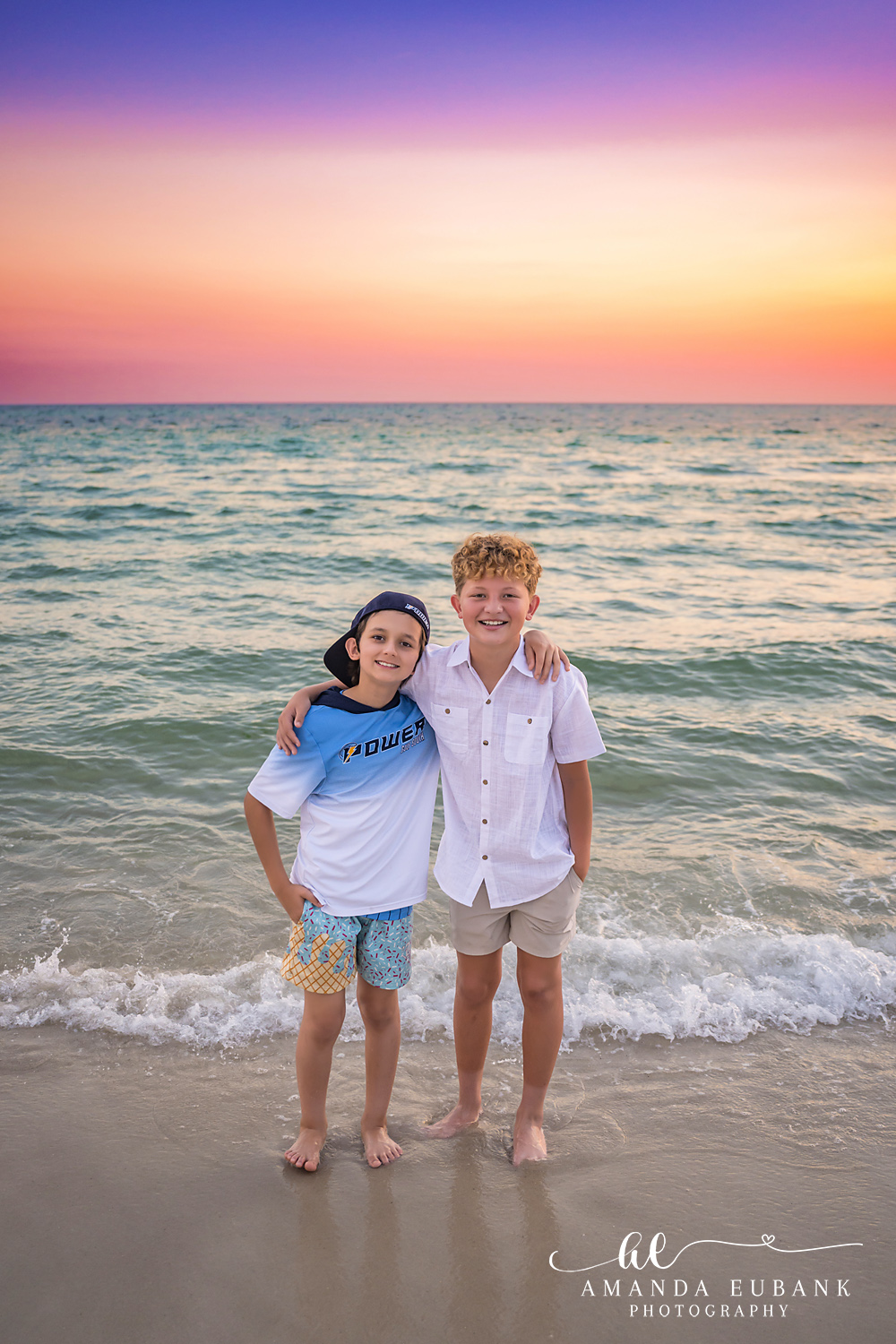 Rosemary Beach Family Photos | Two boys standing together Two boys standing together on the beach in Rosemary Beach, Florida at sunset, photographed by Rosemary Beach family photographer Amanda Eubank