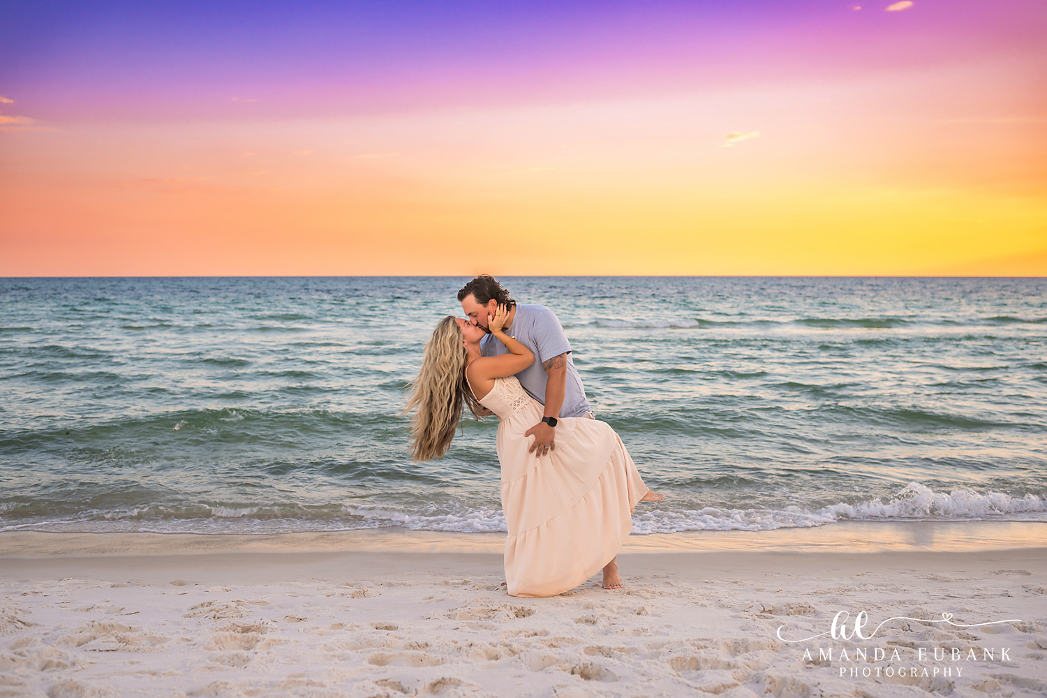 Rosemary Beach Family Photos | Playful couple moment A playful couple moment on the beach in Rosemary Beach, Florida at sunset, photographed by Rosemary Beach family photographer Amanda Eubank