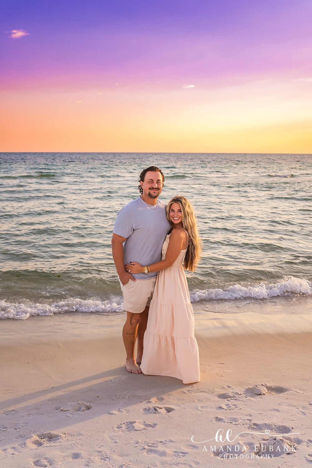 Rosemary Beach Family Photos | Mom and dad posing together Mom and dad posing together on the beach in Rosemary Beach, Florida at sunset, photographed by Rosemary Beach family photographer Amanda Eubank