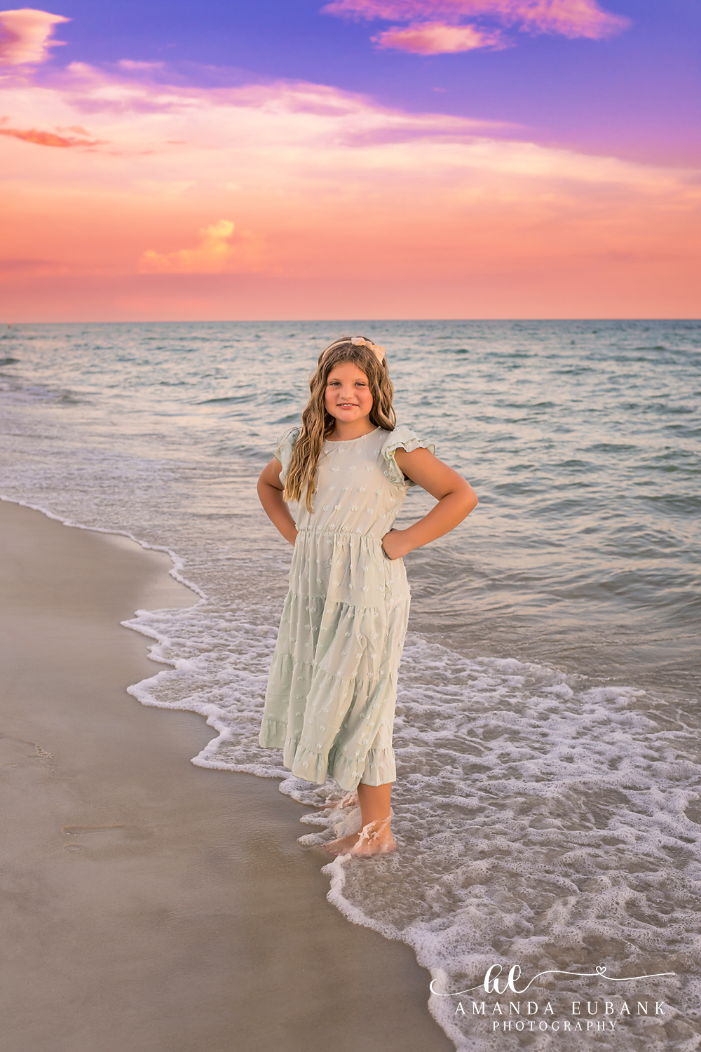 Rosemary Beach Family Photos | Girl in a green dress on the shoreline A girl in a green dress on the shoreline on the beach in Rosemary Beach, Florida at sunset, photographed by Rosemary Beach family photographer Amanda Eubank