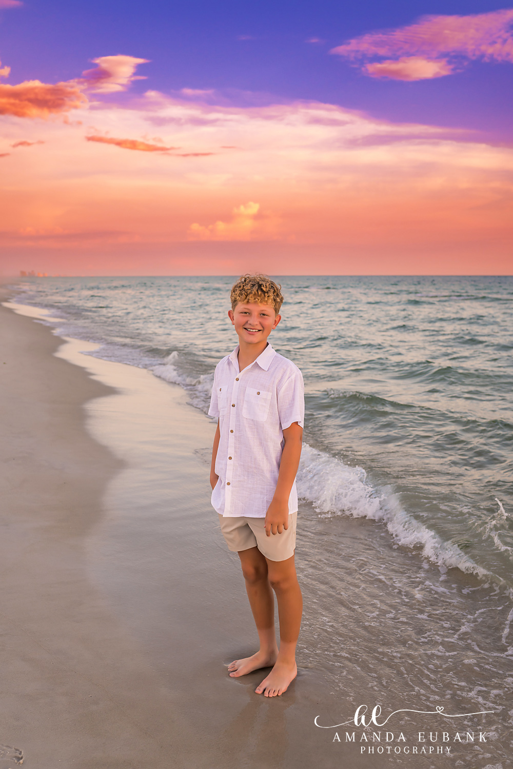 Rosemary Beach Family Photos | Boy standing on the shoreline A boy standing on the shoreline on the beach in Rosemary Beach, Florida at sunset, photographed by Rosemary Beach family photographer Amanda Eubank